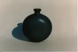 Flattened sphere bottle